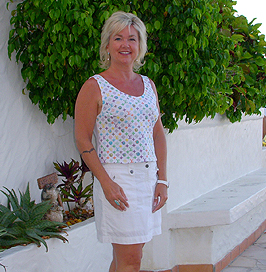 Picture of Cynthia Jones standing in front of her home near NRC.